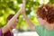 Were awesome. Cropped shot of two teenagers giving each other a high-five.