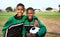 Were best buddies and teammates. Portrait of two young boys playing soccer on a sports field.