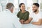 Were going to be parents. a young couple sitting with their obstetrician and holding hands during a consultation in the