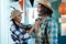 Were gonna be the best scarecrows. a young couple getting dressed for halloween at home.