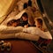 Were never going to sleep. three young children playing in a tent together.