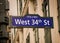 West 34th Street Sign