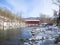 West Arlington Covered Bridge and river on a winter day in Vermont