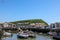 West Bay, Dorset / England - May 31,2020: A view of the pretty harbour at West Bay with Bridport St