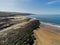 West coast of Ireland, Fanore beach, Clare county, Sandy beach, blue sky and water. Aerial drone view