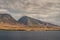 West coast ocean shoreline with 2 mountains near Lahaina, Maui, Hawaii, USA