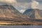 West coast ocean shoreline with 2 mountains near Lahaina, Maui, Hawaii, USA