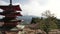 west side of chureito pagoda with mt fuji in the background and cherry blossoms at arakura sengen shrine