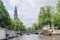 Westerkerk clock tower and canal view in Amsterdam. It is next to Amsterdam\'s Jordaan distr