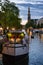 Westerkerk and Houseboat at Sunset in Amsterdam