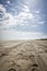 Western Australia - coastline at the Eighty Mile Beach with food prints and car tracks at the sand