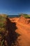 Western Australia â€“ Outback sand track for 4WD car downhill to the ocean at Dampier Peninsula
