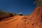 Western Australia â€“ Outback track with 4WD car downhill to the ocean at Dampier Peninsula