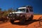 Western Australia â€“ Outback track with 4WD car downhill to the ocean at Dampier Peninsula