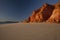 Western Australia â€“ rocky coastline with red colored rocks and blue sky at Dampier Peninsula