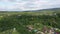 Western Caucasus. Settlement Kamennomostky in the floodplain of the Belaya River. Filmed in the evening from a quadcopter.