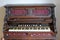 Western Cottage Antique Organ with Pink and Brown