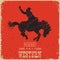 Western Cowboy riding wild horse.Western poster on red paper