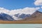 Western Mongolia mountainous landscape. View at Tsaagan Gol River, White River. Altai Tavan Bogd National Park, Bayan-Ulgii