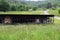 Western NC mountain rural fam barn with winding road