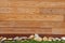 Western red cedar exterior cladding with decorative stones, wood pattern natural background