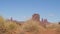 Western Rock Monolith Butte Of Orange Red Color In Desert Of Monument Valley Usa