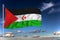 Western Sahara national flag waving in the wind against deep blue sky.  International relations concept