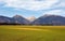 Western Tatras panorama Klin and Bystra peaks, field with grass in foreground