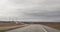 Western Texas highway with wind farm, wind turbines