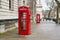 WESTMINSTER, LONDON, ENGLAND- 17th February 2021: Traditional red phone boxes