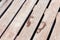 Wet child footprint on brown wooden background