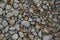 Wet crushed stones of railway ballast