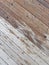 Wet and dry rustic wooden background. Wood texture. Close up of wall made of diagonal wood planks vintage