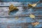 Wet fallen leaves on an old table