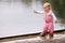 wet girl toddler in puddle