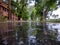 Wet road with wooden trees , natural background