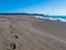 Wet sand foot prints California coast beach