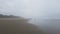 Wet sand and water and beach in Newport, Oregon