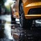 Wet traction Close up of car tires gripping rain soaked pavement