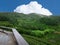 Wet wooden balcony for viewing Beautiful landscape of Tea Plantation 2,000 at Ang Khang mountain, Fang Chiang Mai. Tourist