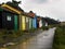 Wet wooden path after the rain, lonely wooden huts. Ocean, Ile d\\\'Oleron, France