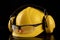 Wet work helmet and safety glasses. Raindrops on health and safety accessories for construction workers
