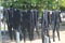 Wetsuits hanging in the sun to dry