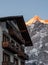 The Wetterhorn mountain, Grindelwald Switzerland with chalet hotel in the foreground. Photographed at dusk.