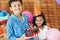 Weve been looking forward to this cake all year. Portrait of a cute little boy and his sister posing with a birthday