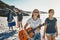 Weve got all the ingredients for a perfect summers day. Portrait of a group of young friends walking on the beach on a