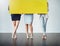 Weve got a special message from the team. Cropped studio shot of a group of businesswomen holding up a blank yellow