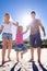 Weve got the whole beach to ourselves. a happy young family enjoying a walk on the beach.