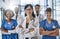 Weve got your health covered. Portrait of a diverse team of doctors standing together in a hospital.