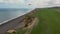 Weybourne beach cliff parachute gliding